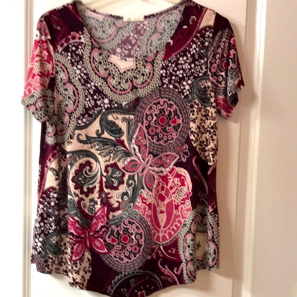 Exclusive One. Size L. Shades of pink, purple and black